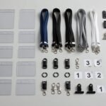 Assorted lanyard ID card holder options with breakaway clasps and badge holders arranged for a bulk order.
